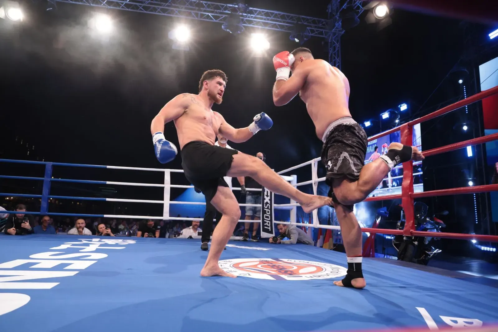 Brudenell calf kicks Xhaja in the quarter final